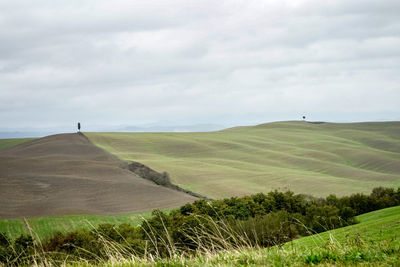 Scenic view of land against sky