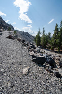 Rocks on land against sky