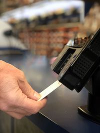 Close-up of man using mobile phone