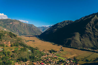 Sacred valley of the incas - scenic view of mountains against clear blue sky