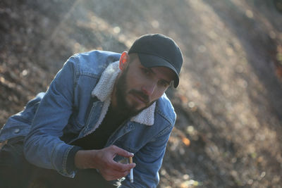 Young man looking away outdoors