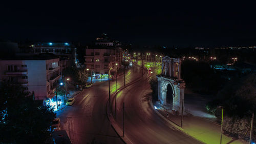 High angle view of light trails on road at night