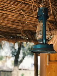 Low angle view of lantern hanging from ceiling