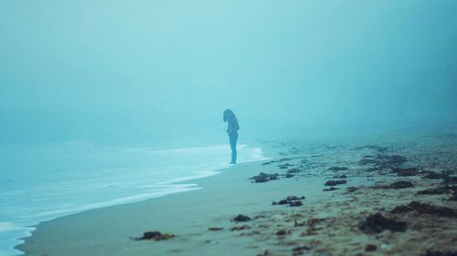 Man standing on beach