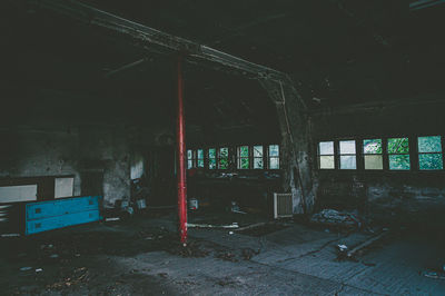 Abandoned building seen through window