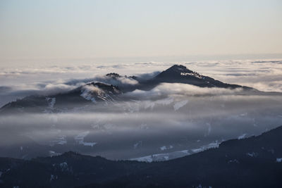 Scenic view of mountains against sky during sunset