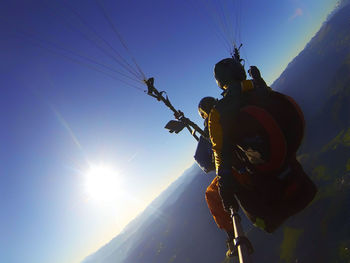 Low angle view of ski lift against sky