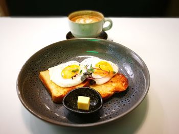 Close-up of breakfast served on table