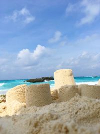 Scenic view of beach against sky