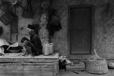 People sitting on wicker basket