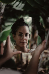 Portrait of a smiling young woman outdoors