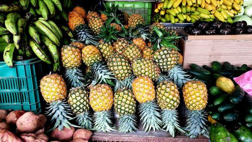 Fruits and vegetables for sale at market stall