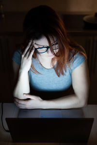 High angle view of woman using laptop