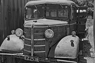 Close-up of abandoned car