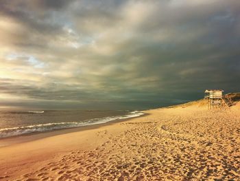 Scenic view of beach against sky