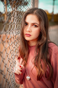 Portrait of beautiful woman drinking glass