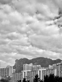 Buildings in city against sky