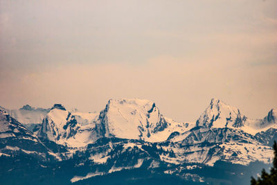 Snow covered mountain against sky