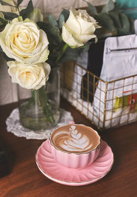 Close-up of roses on table