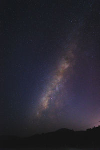 Low angle view of stars in sky at night