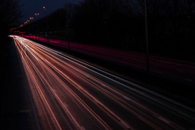 Light trails on road at night