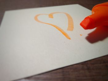 Close-up of human hand on table