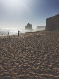 Scenic view of beach against clear sky