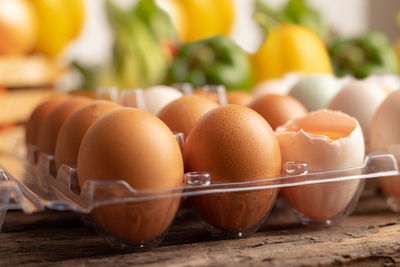 Close-up of eggs in container on table