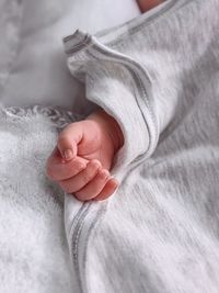 Low section of baby feet