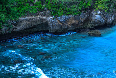 Scenic view of rocks in sea