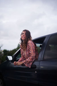 Young woman traveling in car