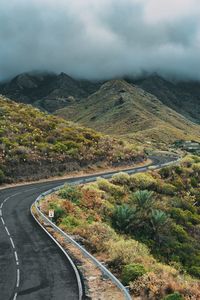 Curved empty road in picturesque mountain landscapes at sicily, italy.