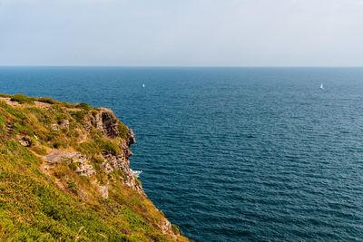 Scenic view of sea against clear sky