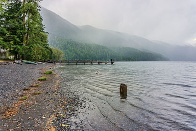 A pier along the shoreline at lake crescent in washington state.
