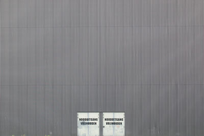 Text on wall of building