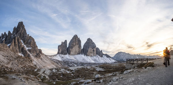 Scenic view of mountains against cloudy sky