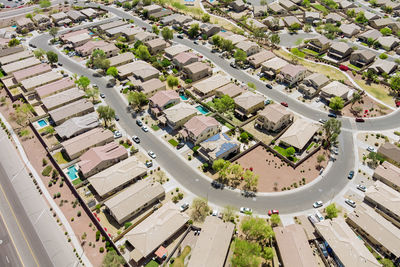 High angle view of street amidst buildings in city