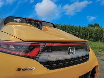 View of yellow car against sky