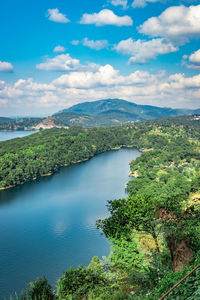 Serene lake with mountain background at day from top angle