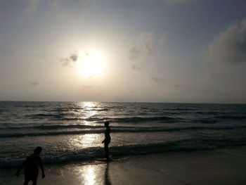 Scenic view of sea at sunset