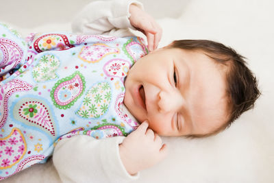 Cute baby sleeping in bed