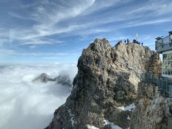 Low angle view of rock formation against sky