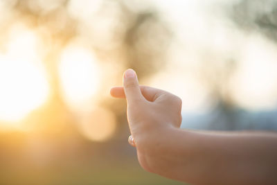 Midsection of person against blurred background