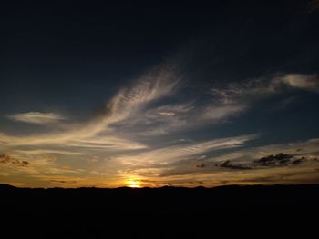 Low angle view of dramatic sky during sunset