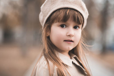 Portrait of cute girl outdoors