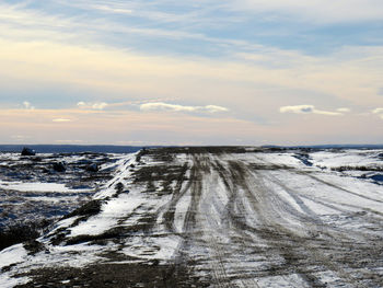 Scenic view of sea against sky during winter