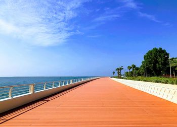 View of calm blue sea against sky