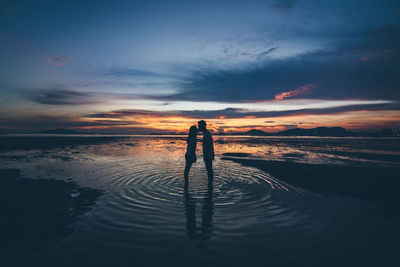 Scenic view of sea at sunset