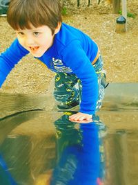 Boy playing in water