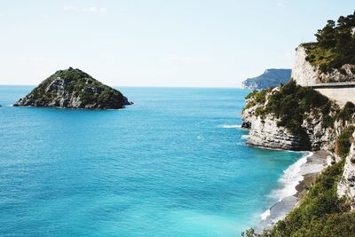 Scenic view of bay against clear sky